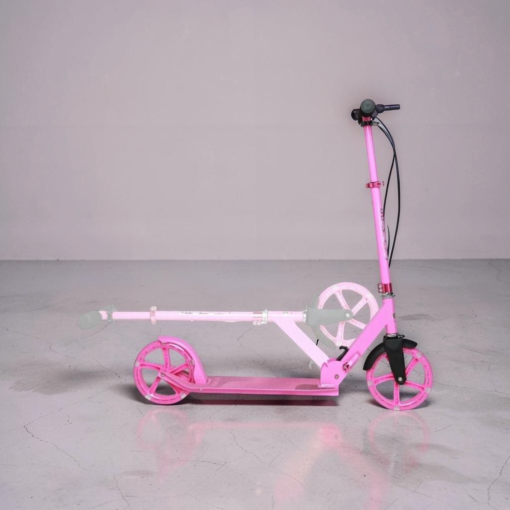Skládací koloběžka Story Urban GO! pink LED kola lifestyle 2
